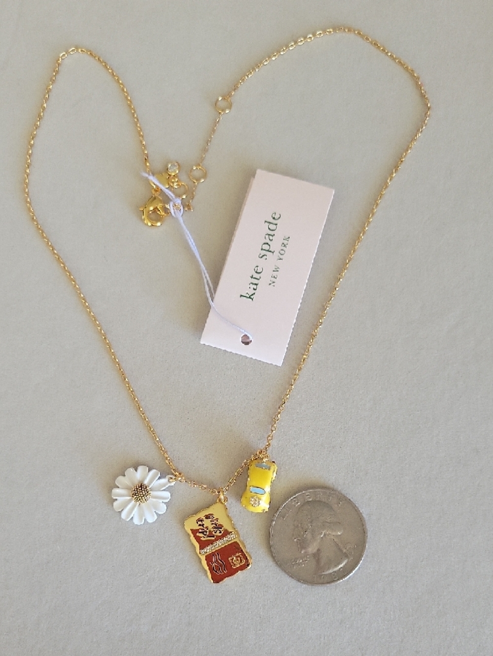 Kate Spade Gold Chain Necklace with Daisy, Yellow Car & 'Girls Trip' Charm - Picture 4 of 8